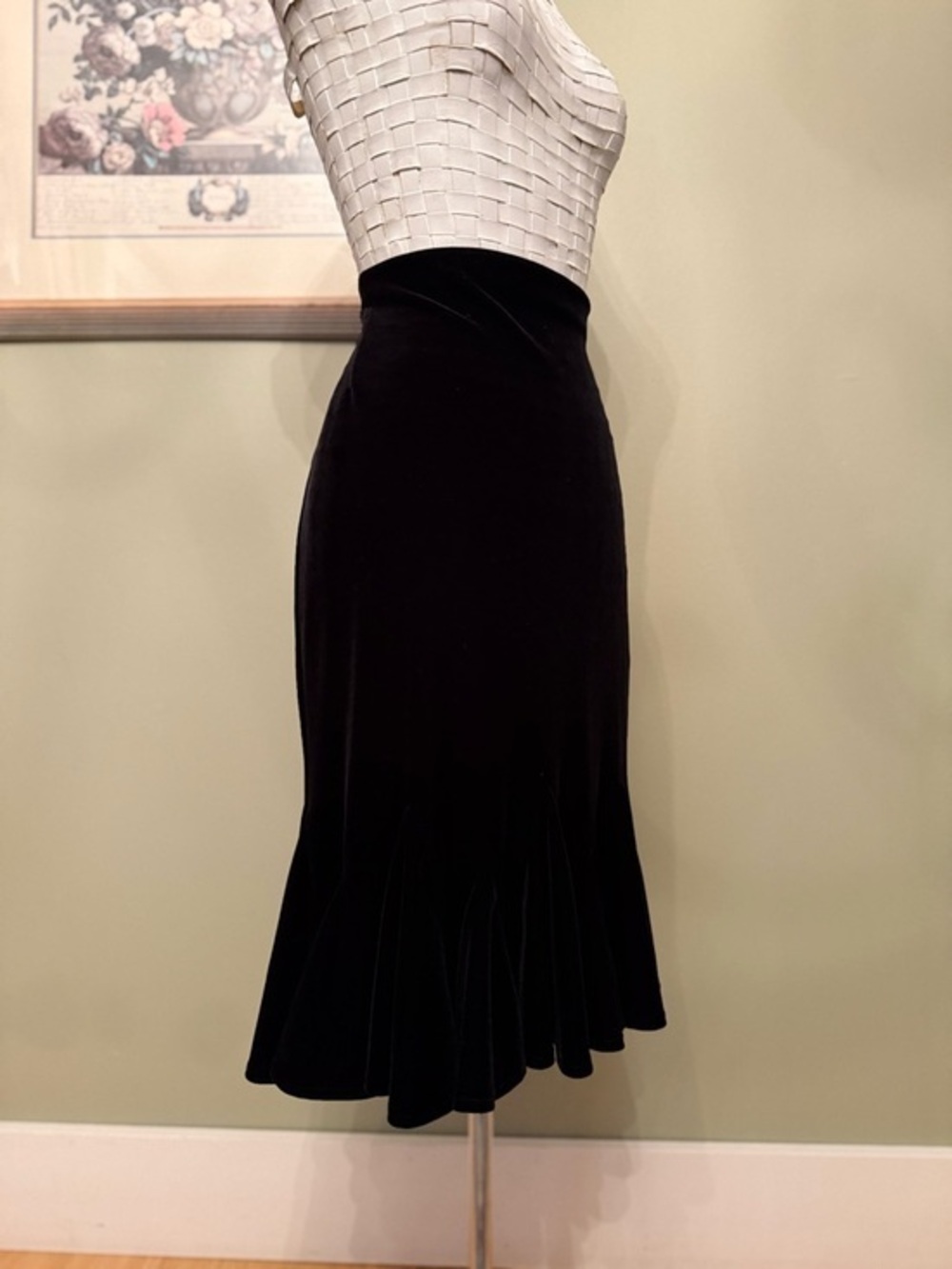 JS Collections black High-waisted midi/maxi length with a mermaid/trumpet flare.